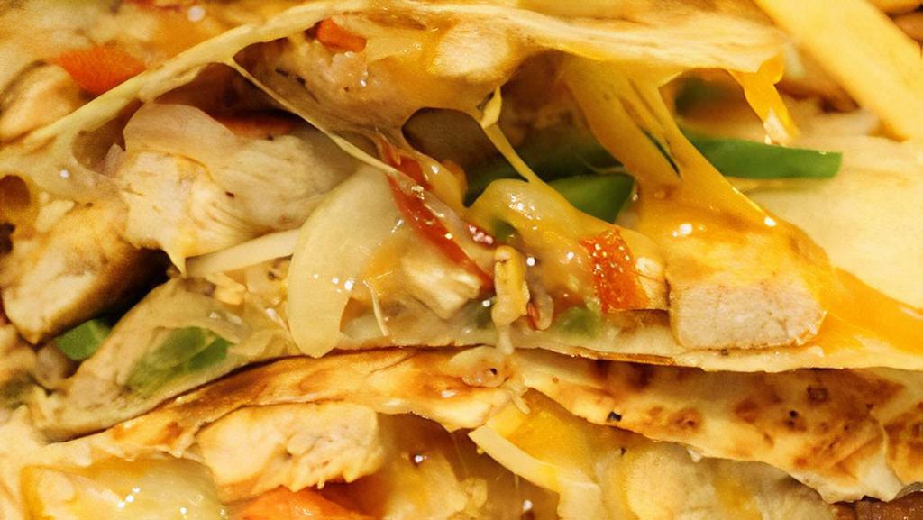 Chicken Quesadilla · Grilled Chicken Breast with peppers, onions, and cheddar cheese served with sour cream