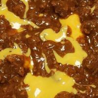 Chili Cheese Fries · Golden crisp French fries topped with beef chili and cheese