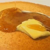 Pancakes · Three Buttermilk Pancakes served with butter and syrup