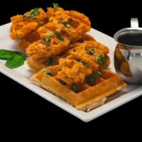 Chicken N' Waffles · Traditional waffle topped with breaded chicken and fresh basil.  Served with your choice of ...