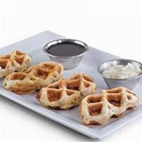 Pig Dippers · Sausage wrapped in a biscuit and served. with choice of sausage gravy, maple syrup. or musta...