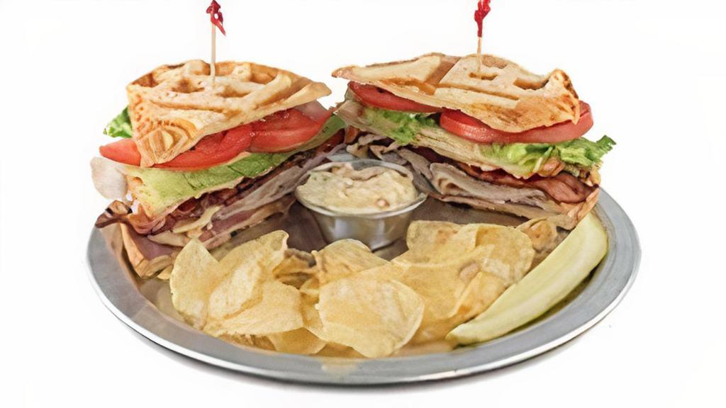 Classic Club · Roast beef, turkey, bacon, pepper jack. cheese, provolone, lettuce, and tomato,. on toasted sourdough bread, served with. chips, pickle spear, and a side of sun-dried. jalapeño mayo.