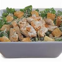 Chicken Caesar Salad · Grilled chicken, parmesan cheese and croutons served on a bed of romaine lettuce and drizzle...
