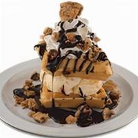 Chocolate Chip Cookie Waffle · Cookie stuffed waffle and. vanilla ice cream, topped with. whipped cream and chocolate sauce.
