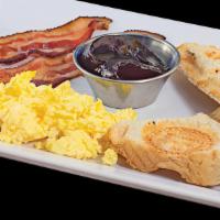 Mom'S Breakfast · Scrambled eggs, sausage (or bacon), toast (or biscuit) with grape jelly or syrup.