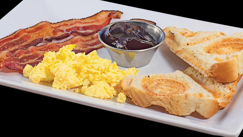 Mom'S Breakfast · Scrambled eggs, sausage (or bacon), toast (or biscuit) with grape jelly or syrup.