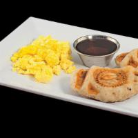 Piggy Dips · 2 Pig Dippers, scrambled eggs, choice or syrup or grape jelly.