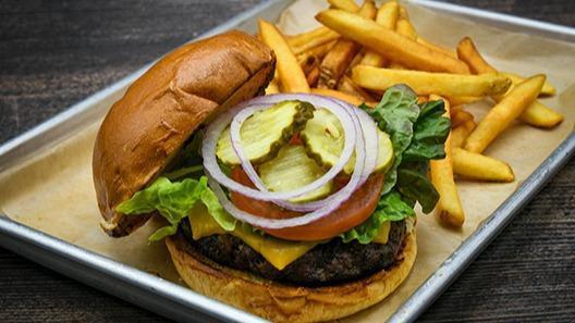 Cheeseburger · American cheese, lettuce, tomato, pickles, red onion.