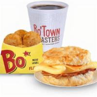 Bacon, Egg & Cheese Biscuit Combo · Eggs, hickory smoked bacon and American cheese on a made-from-scratch buttermilk biscuit, se...