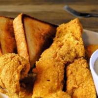 Rosie'S Fish & Grits · Lightly breaded fillets served over bed of buttered grits with your choice of bread.