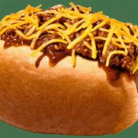 Chili Cheese Pup · This fully loaded Chili Cheese Pup will have you drooling. Submerged beneath our chili, spri...