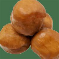 Glaze Bombs - 10Pc · Satisfy your sweet tooth with this sweet deal! These bite-sized glazed donut holes are serve...