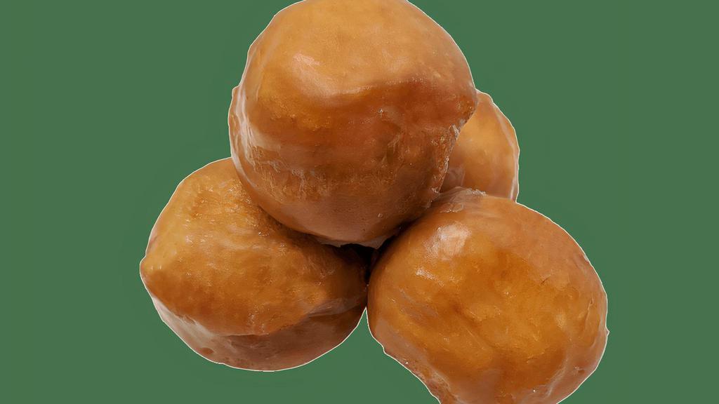 Glaze Bombs - 4Pc · Satisfy your sweet tooth with this sweet deal! These bite-sized glazed donut holes are served hot, all day.