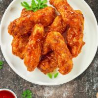 Sizzling Bbq Tenders · Chicken tenders breaded and fried until golden brown before being tossed in spicy barbecue s...