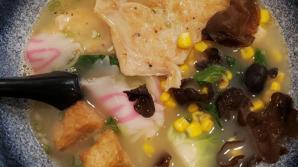 Tokyo Chicken Ramen · Creamy chicken broth with chicken, fried tofu, soft boiled egg, Chinese greens, fish cake, wood ear mushroom and scallions.