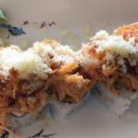 Volcano Roll · Shrimp tempura, cheese & avocado inside: spicy crab, eel sauce and spicy mayo on top