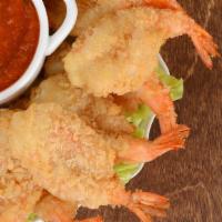 Butterfly Shrimp Combo · Sliced shrimp coated with flour and breadcrumbs and crispy fried until golden brown. Served ...