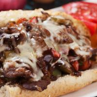 Philly Sub Combo · Choice of spicy, western, steak or chicken philly. Topped with green pepper, onion, mushroom...