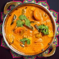 Korma Kryptonite · Your choice of protein cooked in a rich, creamy tomato, and onion curry