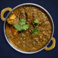 It'S A Saag Day · Your choice of protein cooked in spinach gravy infused with garlic, ginger, spices and a tou...