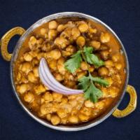 Are You Chana Get Me? · Chickpeas cooked in a tomato and onion gravy with Indian spices.