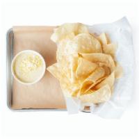 Tortilla Chips & Queso · House-Made from Scratch Tortilla Chips & Queso. (V | GF)