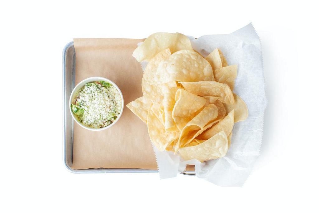 Tortilla Chips & Guacamole · House-Made from Scratch Tortilla Chips & Guacamole. (V | GF)