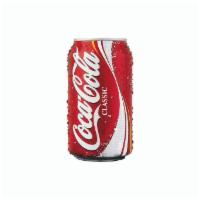 Coke · *Item may differ than pictured. In most locations we serve fountain drinks in a 16 oz. cup.