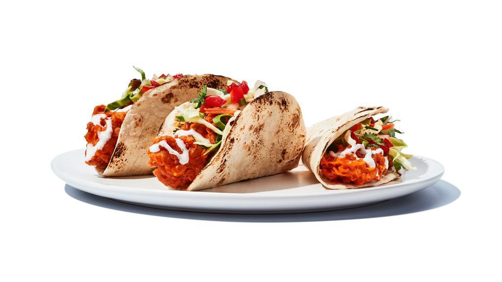 Buffalo Chicken Tacos · Grilled or crispy chicken tossed in your favorite wing sauce, topped with cabbage, diced tomatoes and your choice or ranch of bleu cheese inside flour tortillas. Grilled 700-1000 cal | Fried 950-1250 cal| lite ranch or bleu cheese 310/380 cal