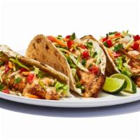 Fish Tacos Grilled · Grilled cod served on soft tortillas with pico de gallo, cabbage and house spicy sauce. 700 ...