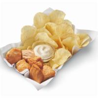 Rotisserie-Style Chicken Bites Combo · DQ’s new 100% white meat, juicy, tender, rotisserie-style chicken bites, served with chips, ...