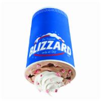 Peppermint Hot Cocoa Blizzard® Treat · Peppermint candy cane pieces, Cocoa Fudge and choco chunks topped with whipped topping and c...