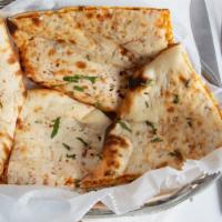 Peshawari Naan · Naan stuffed with mixed nuts and raisins.