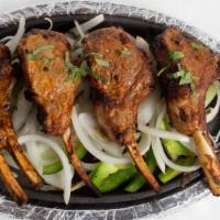 Tandoori Lamb Chops · Lamb chops marinated in chef’s special recipe and cooked in clay oven.