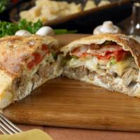Johnny’S Italian Special Calzone · Pepperoni, sausage, mushrooms, onion & green peppers with seasoned ricotta & mozzarella chee...