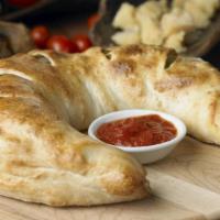 Build Your Own Stromboli · Start with a delicious Johnny's Cheese Stromboli with shredded mozzarella cheese. Add additi...