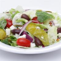 Greek Salad Small · Iceberg & romaine mix with tomatoes, onions, feta cheese, pepperoncini peppers & Greek olives.