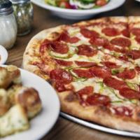 Family Special · Get One Large Pizza with 2 regular toppings, 2 regular Garden Salads and an order of Cheese ...