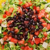 Cuban Chop-Chop® (Large) · Freshly grilled chopped chicken breast, lettuce, tomatoes, and black beans over yellow rice ...