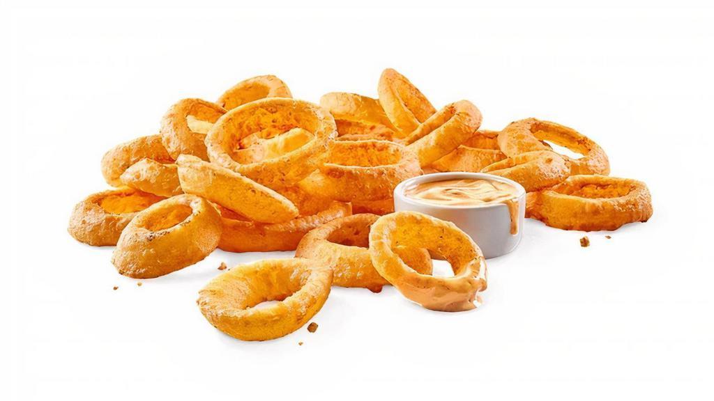 Large Beer-Battered Onion Rings · THICK-CUT ONION RINGS / BEER BATTER / SOUTHWESTERN RANCH.