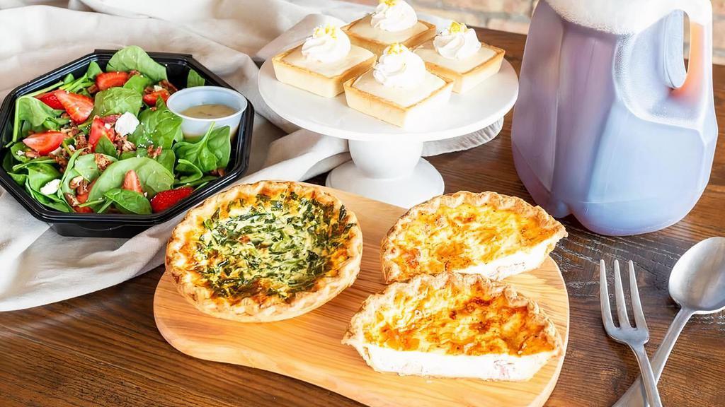 Cafe Classics For 4 · A tasty menu of items for their special day: two homemade quiche, a strawberry bacon spinach salade, a gallon of iced tea and four lemon tarts.