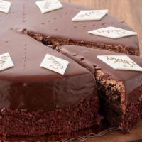 Whole Sacher Torte · Three chocolate cake layers soaked with vanilla syrup and filled with a thin layer of raspbe...