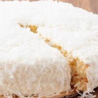 Whole Coconut Cream Cake · Moist coconut syrup-soaked white cake layers filled with creamy coconut custard and sweet to...