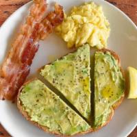 Nouveau Breakfast · One egg cooked-to-order, avocado toast & two strips of bacon.