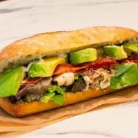 Chicken Riviera · Shaved, balsamic-marinated chicken, basil pesto, avocado, bacon lettuce, and mayonnaise on a...