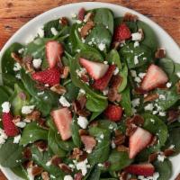 Strawberry Bacon Spinach Salade · It's Back! Spinach salad topped with strawberries, bacon, feta and pecans. Tossed in French ...