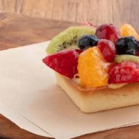 Fresh Fruit Tart · Flaky vanilla pastry shell filled with smooth vanilla pastry cream and topped with seasonal ...