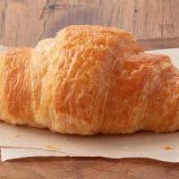 Butter Croissant · Flaky dough layered with rich, creamy butter. 

**For orders of 5 or more six-packs please c...