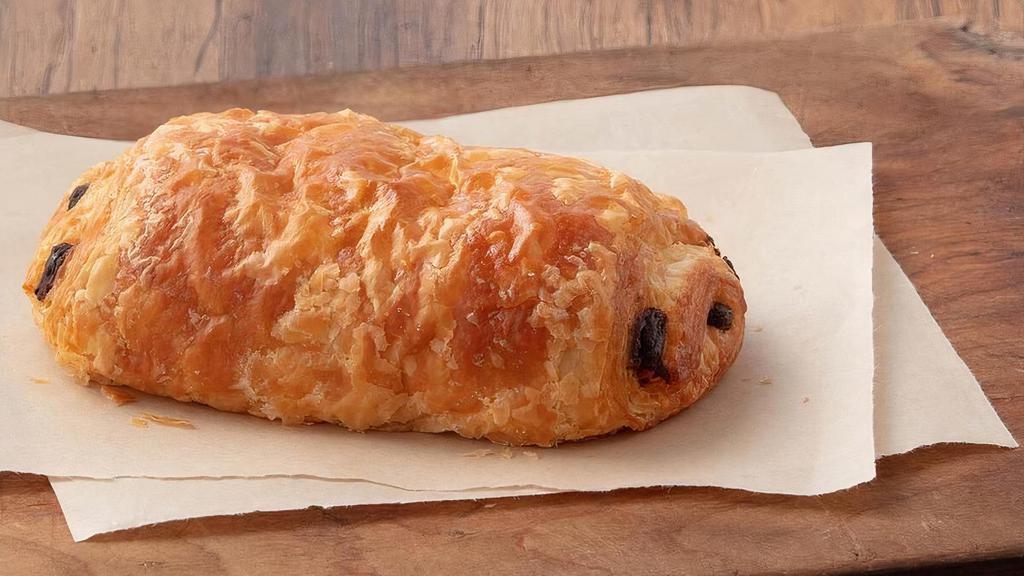 Chocolate Croissant · Flaky dough filled with a luscious dark Belgian chocolate. 

**For orders of 5 or more six-packs please contact the cafe directly for availability**