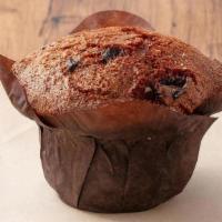 Bran Muffin · Bran muffin batter mixed with raisins.